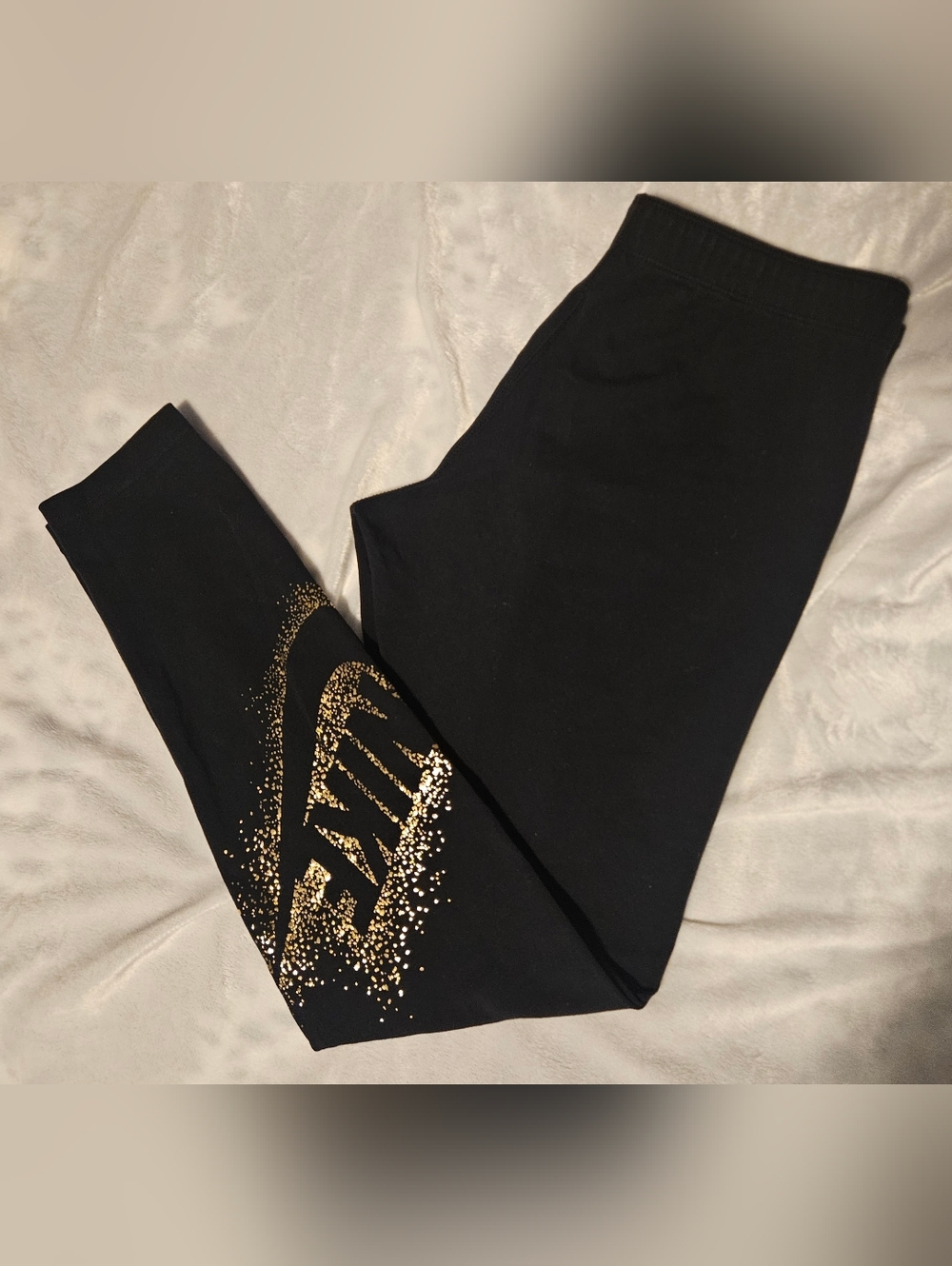 Nike Black Leggings with Metallic Gold Logo Accent